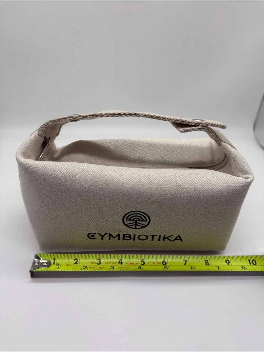 Cymbiotika Off White Herringbone Canvas Toiletry Cosmetic Travel Bag NWOT